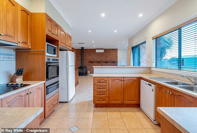 The ranch-style home was built in 2000 and features an open living and dining area connected to the kitchen