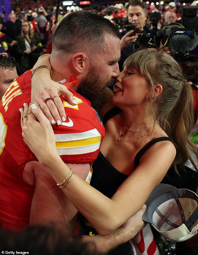 Taylor performed two surprise songs during the set, which came after fans speculated she was secretly engaged to boyfriend Travis Kelce (pictured in February)