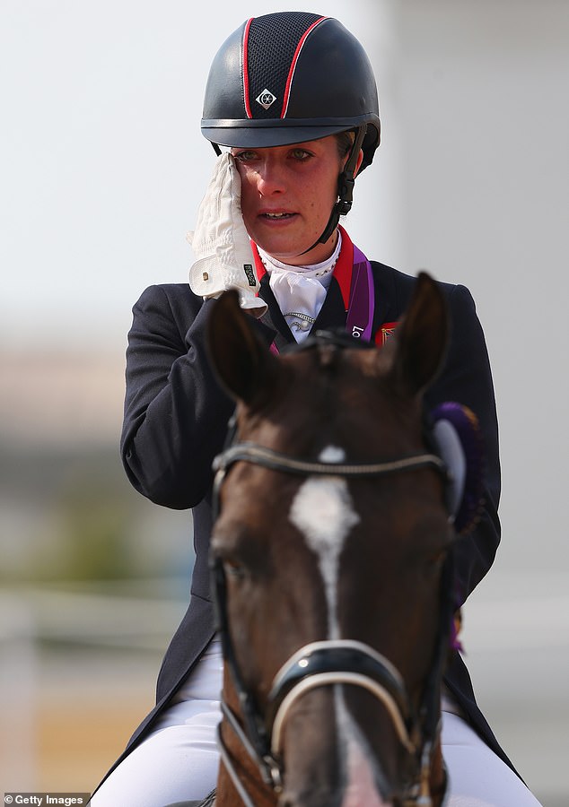 Dujardin (pictured, at the 2012 Olympics) hoped to become Britain's most decorated Olympian but was forced to withdraw from the Games on Tuesday