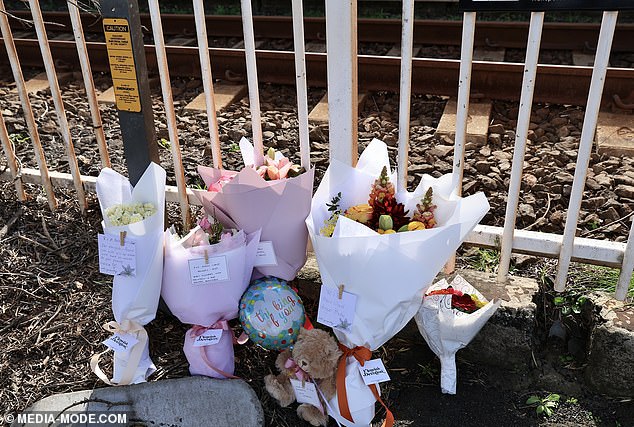 Tributes have been left at the station for Anand Runwal and his two-year-old daughter Hilal