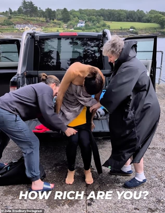 Her friends who were out with her for the day noticed that she was struggling and started to help her.