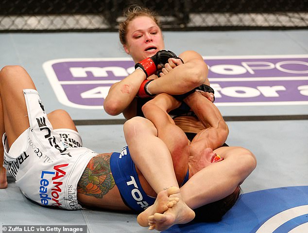 Rousey went 12-0 in MMA, including six wins in the UFC, without seeing the judges' cards