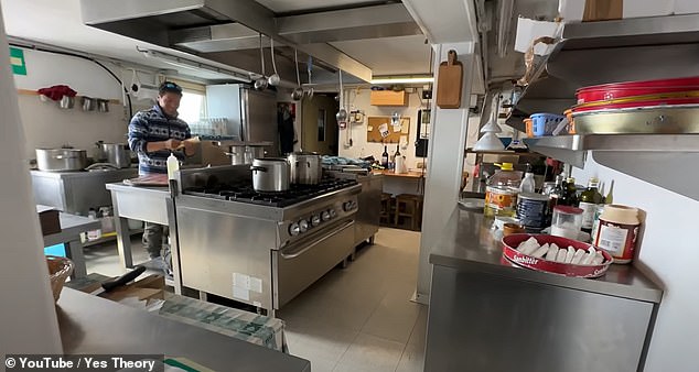 Thomas gives viewers a tour of the hotel, including a large kitchen where the famous pizza is prepared