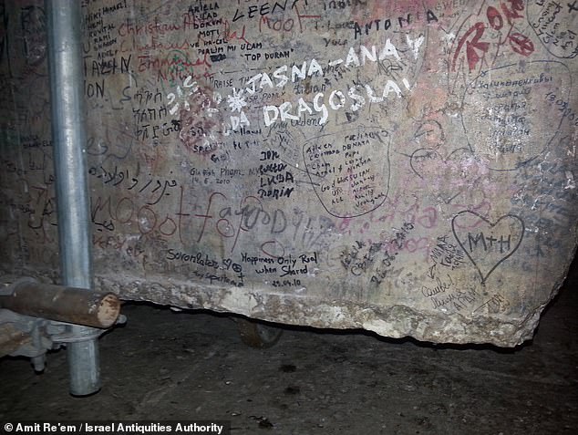 The discovery was made after construction workers turned over a giant stone slab with graffiti that was leaning against the wall of the Church of the Holy Sepulchre, revealing a much older artistic heritage