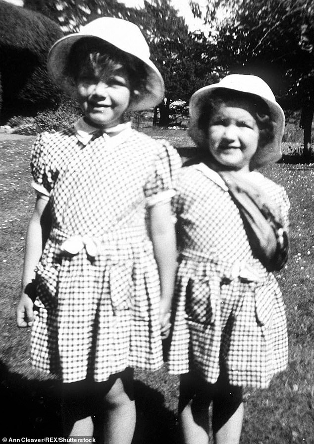 Camilla and Annabel Elliot together in 1952 when they were four and two years old respectively