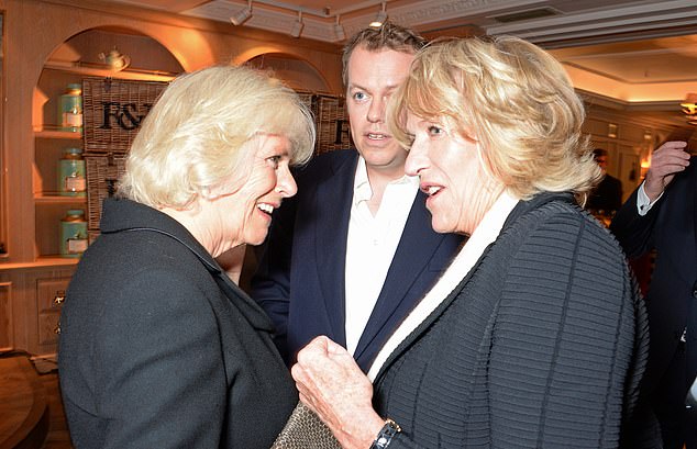 Camilla and Annabel Elliot with Camilla's son Tom Parker Bowles in London in March 2014