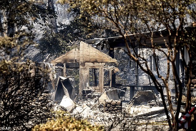 The fire has already destroyed a number of houses and other buildings in its path