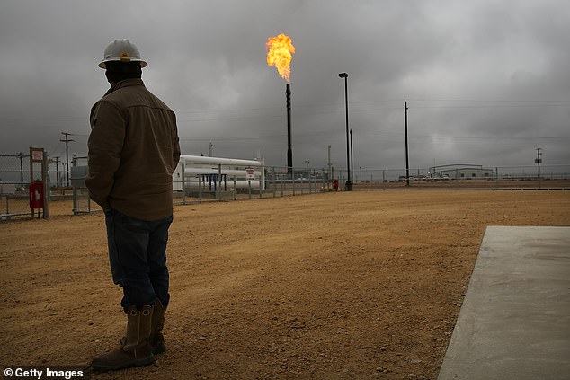 Scientists have speculated that the recent series of earthquakes in Texas is largely due to hydraulic fracturing — also known as fracking — in which wastewater is injected into the earth to release natural gas for energy. Pictured: A fracking site in Garden City, Texas