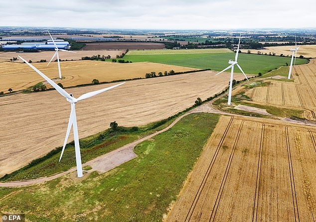 An image taken by a drone shows wind turbines at a wind farm in Biggleswade