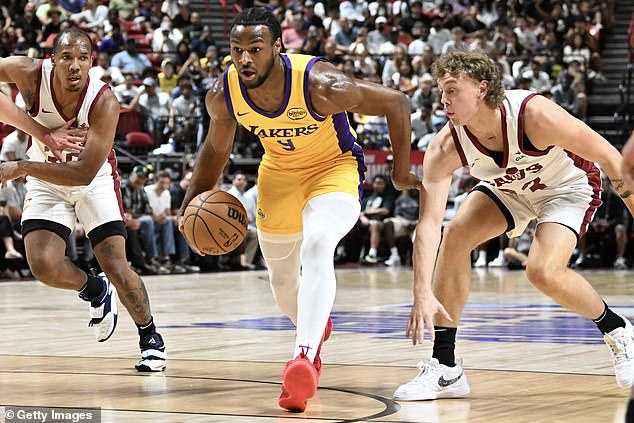 Bronny James splits the Cavs' summer league defense during a recent game in Las Vegas