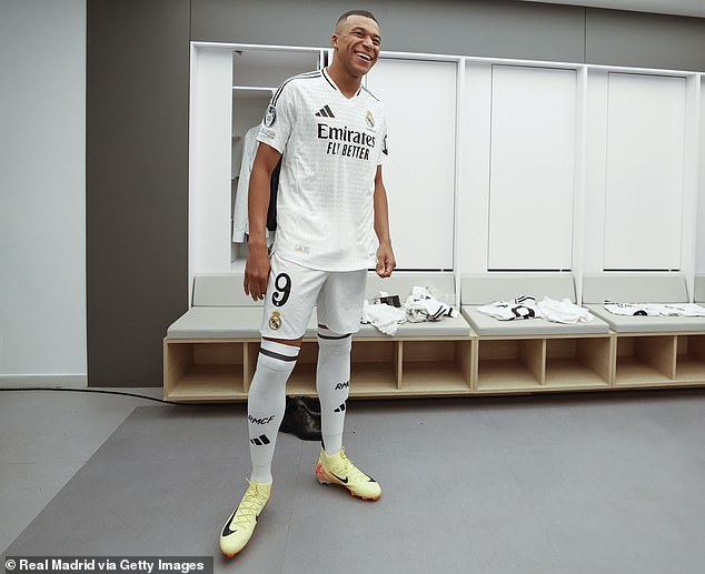 Mbappe pictured in the dressing room of the famous Estadio Santiago Bernabeu, home of Madrid