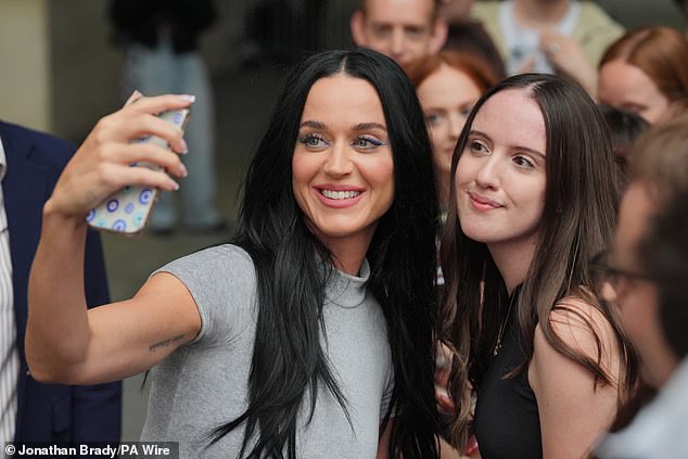 The singer posed for selfies with the audience