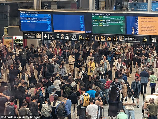 Paris train station is packed with passengers as France's high-speed TGV network was severely disrupted on Friday