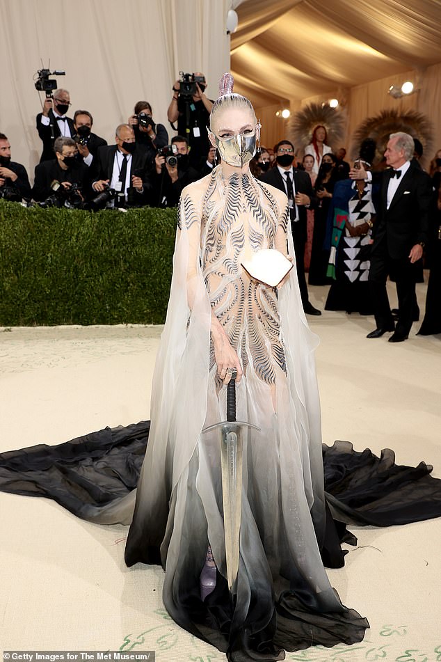 Last April, it seemed like the two were back on good terms, based on an unusually brief exchange on X. Grimes is seen holding a sword at the 2021 Met Gala in Manhattan