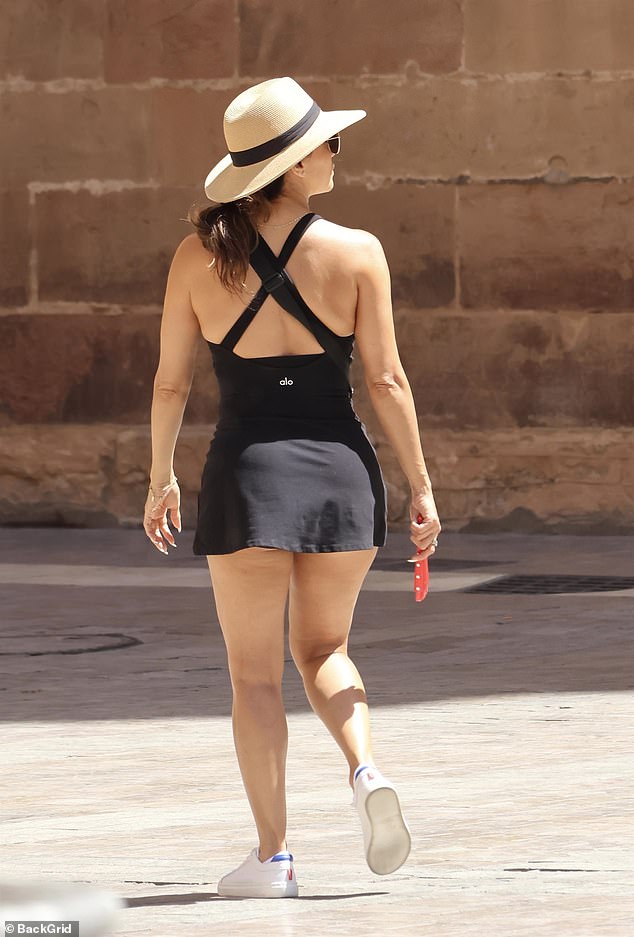 The couple, who have six-year-old son Santiago together, enjoyed the sights of the Spanish town as they braved the heat, with Eva carrying a red fan to keep herself cool