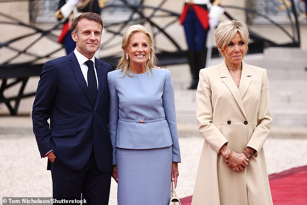 French President Emmanuel Macron, Jill Biden and Brigitte Macron at the Elysee Palace for the reception of the heads of state