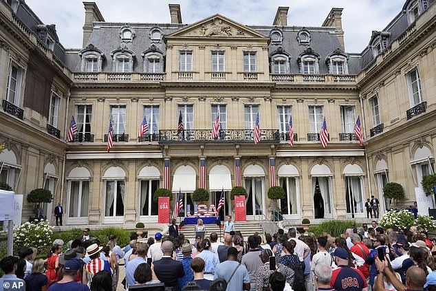 First lady Jill Biden speaks with family members of the U.S. Olympic team at the U.S. ambassador's residence in Paris