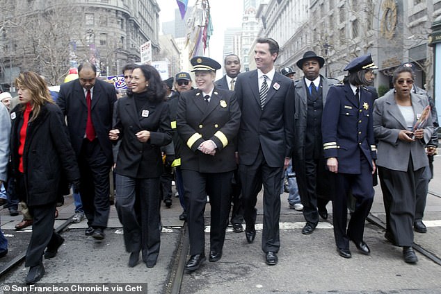 Kamala Harris, then San Francisco's district attorney, and then-city mayor Gavin Newsom and others participate in the Martin Luther King, Jr. Freedom March in 2004