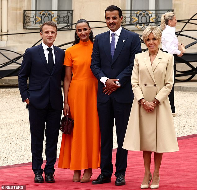 Pictured: Emir of Qatar, Sheikh Tamim bin Hamad bin Khalifa Al Thani and his wife during the event today