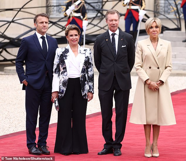 Pictured: Maria Teresa, Grand Duchess of Luxembourg and Henri, Grand Duke of Luxembourg with the Macrons