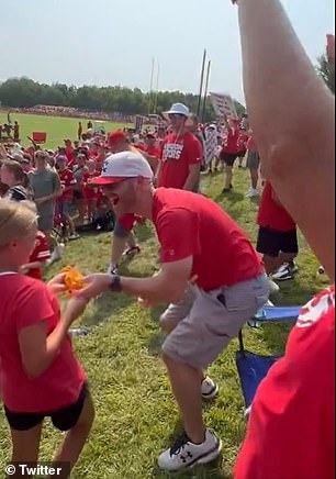 Kelce threw his gloves at her after practice