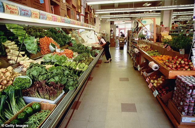 Herbs are also outdoor plants, which means it's difficult to maintain their optimal conditions indoors (file photo of a produce section in a supermarket)