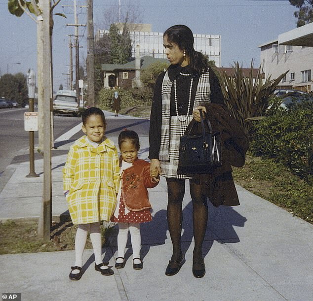 Kamala is seen as a child in January 1970, with her younger sister Maya and mother Shyamala, outside their Berkeley, California home before the Harris family moved to Canada