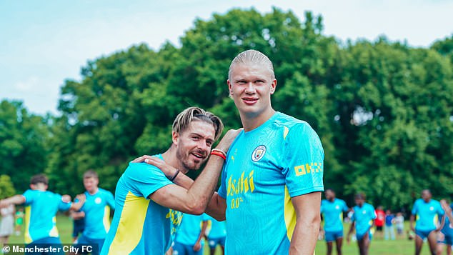 Jack Grealish and Haaland pose during a training session in Central Park in New York City