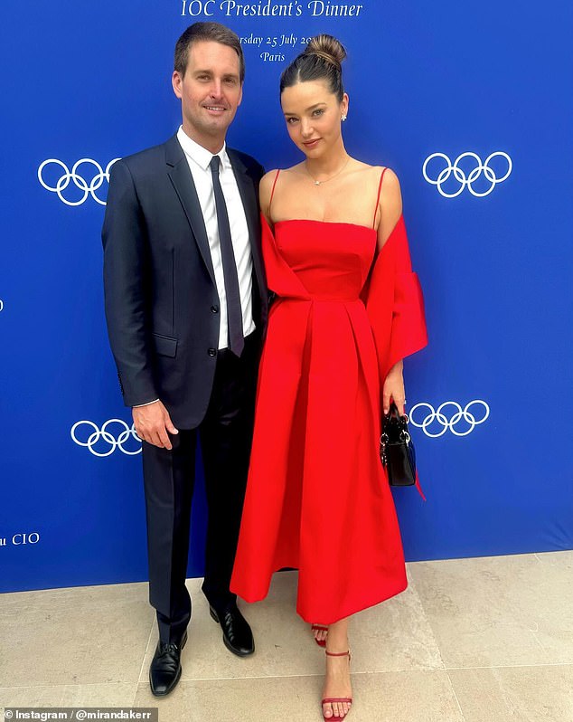 The Australian supermodel, 41, shared a gallery of fiery photos on Instagram showing her taste for luxury fashion as she heads to an IOC event