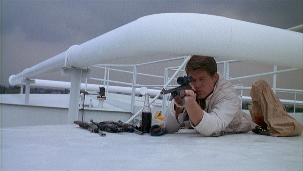 Tim O'Kelley as Bobby Thompson lies on a roof with a sniper rifle in Targets