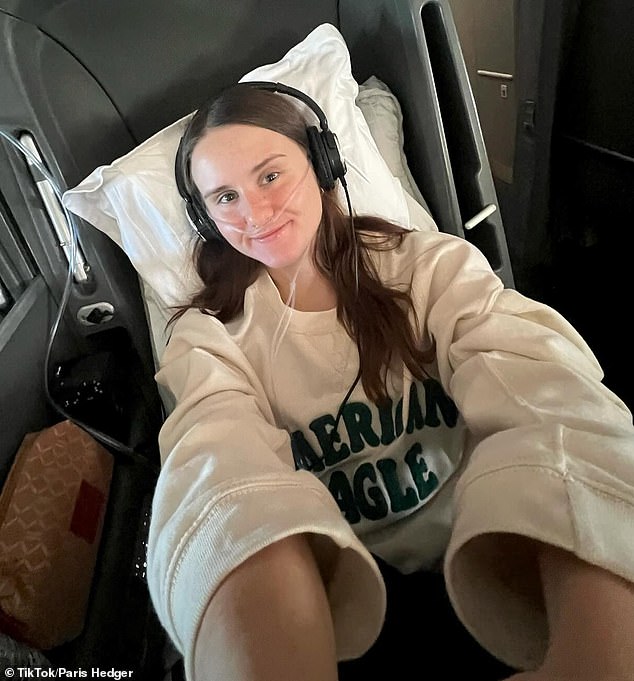 She had to take a medically assisted business class flight from the US to Australia, which would have cost her $34,000 if she did not have travel insurance.