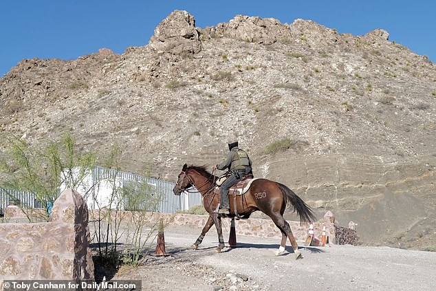 Border Patrol agents venture onto the trails of Mount Cristo Rey to corner a group of illegal immigrants