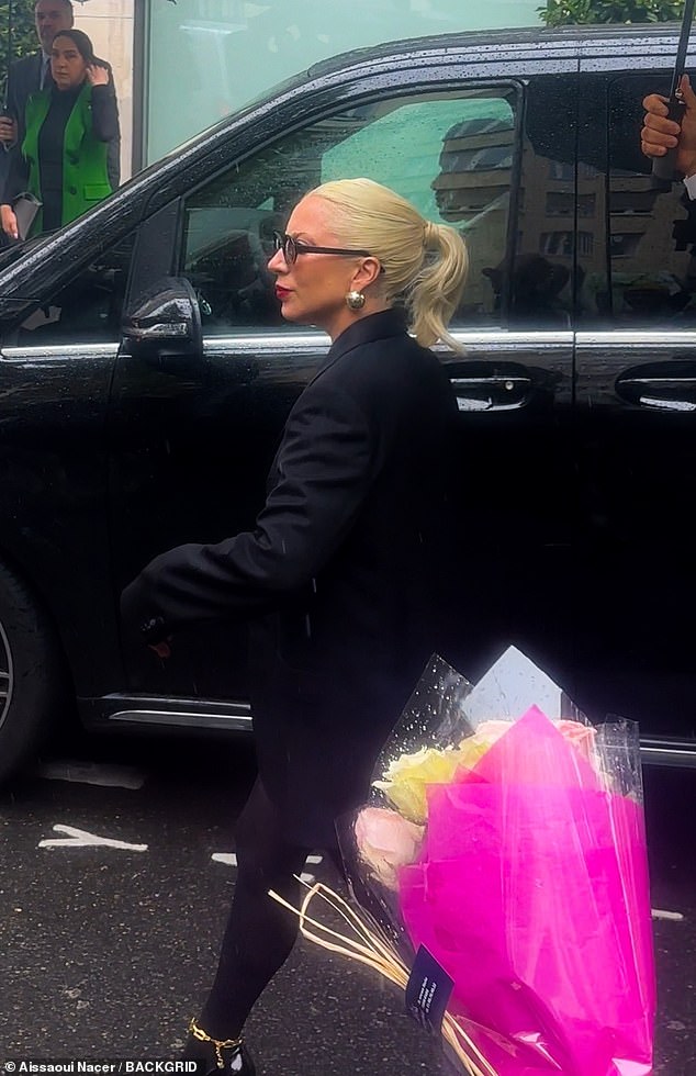 Gaga, real name Stefani Joanne Angelina Germanotta, carried her essentials in a black and white designer bag from CELINE