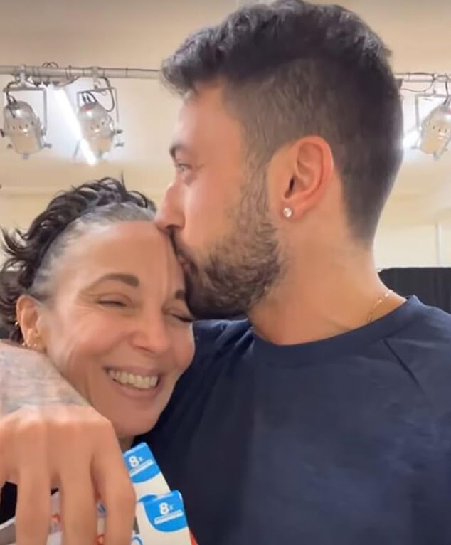 Pernice kisses Miss Abbington on the forehead during rehearsals for the dance competition