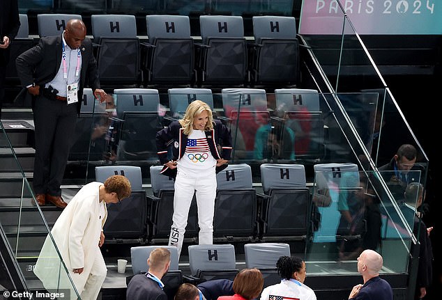 Biden represented the stars and stripes, wearing the team uniform with a Ralph Lauren blazer