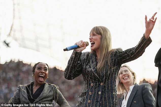 Taylor wore a black glitter jacket during the set