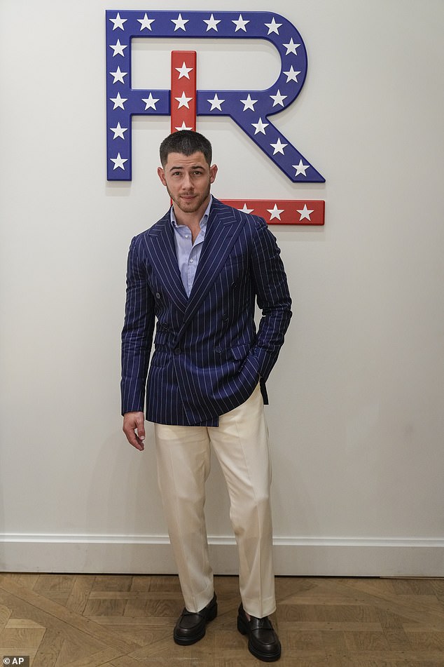 Also in attendance was Nick Jonas of The Jonas Brothers who looked handsome in a pinstripe blazer, light blue shirt and beige pants with loafers