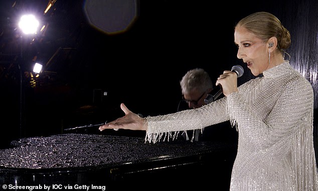 Celine Dion sings L'Hymne à l'Amour to close the opening ceremony