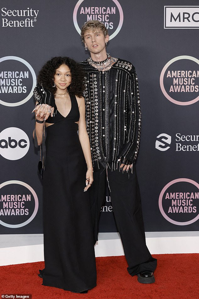 Meanwhile, MGK shares daughter Casie, 14, with ex Emma Cannon; seen with his daughter at the 2021 American Music Awards in Los Angeles