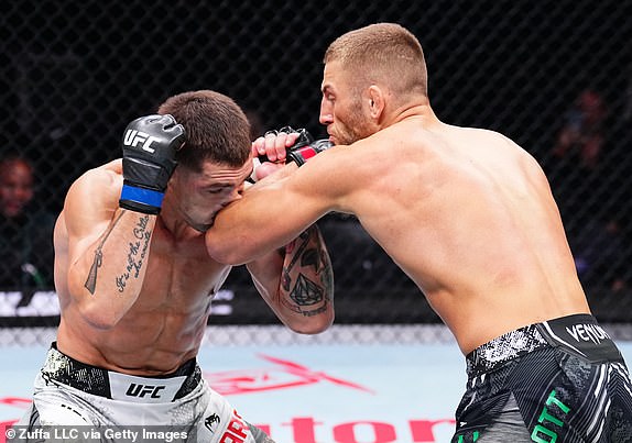 MANCHESTER, ENGLAND - JULY 27: (RL) Oban Elliott of England elbows Preston Parsons during a welterweight bout during the UFC 304 event at Co-op Live on July 27, 2024 in Manchester, England. (Photo by Chris Unger/Zuffa LLC via Getty Images)