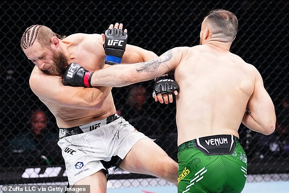 MANCHESTER, ENGLAND - JULY 27: (RL) Modestas Bukauskas of Lithuania defeats Marcin Prachnio of Poland in a light heavyweight bout during the UFC 304 event at Co-op Live on July 27, 2024 in Manchester, England. (Photo by Chris Unger/Zuffa LLC via Getty Images)