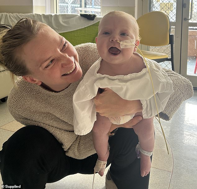 Each year in Australia, between 2,400 and 3,000 babies are born with congenital heart defects, like Rocco (pictured with Mrs Kennewell)