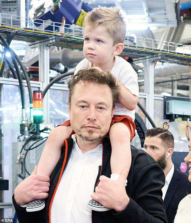 Garossin claimed X was supposed to be with Grimes, real name Claire Boucher, but was taken to France by Musk. Pictured: Musk and X visit a Tesla factory in Austin, Texas in 2023