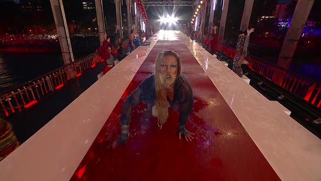 A performer uses the table catwalk as a stage as they dance along to hits from around Europe