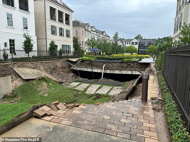 Photos from the Houston Fire Department show a grassy area and nearby sidewalk subsided about 10 feet from the collapse, which appeared sudden.