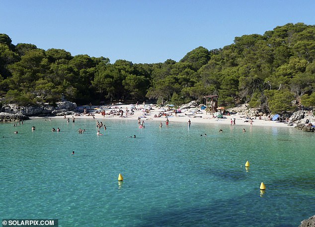 Pictured: Cala Turqueta, which is usually full of tourists lying on the beach and swimming