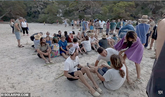 Yesterday's protest in Menorca (pictured) was the first on the island since June 8. About 1,000 people gathered in a central square in the capital, Mahon.