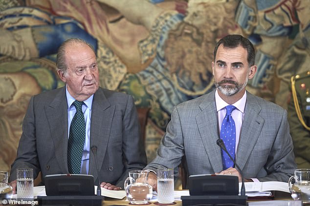 Former King Juan Carlos pictured with his son King Felipe VI of Spain, who Juan was reportedly told to prevent from 'falling in love' with his secret daughter