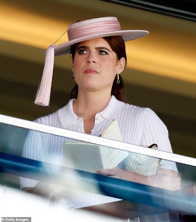 Princess Eugenie holds her Anya Hindmarch clutch under her arm at Ascot 2024