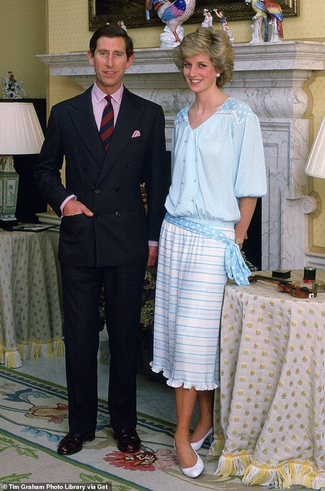 Charles (left) and Princess Diana (right), pictured at home at Kensington Palace in 1985